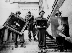 JJR with notebook on the steps of Neuschwanstein - MAY 1945. (National Archives and Records Administration, College Park, MD)
